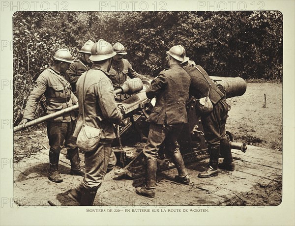 Artillery soldiers firing mortar