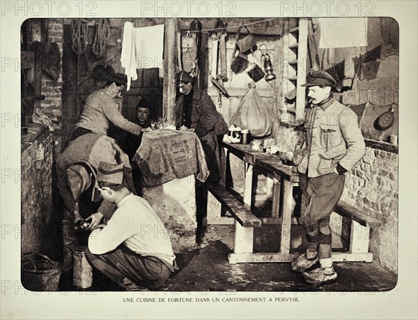 Soldiers at rest eating in barn at Pervijze in Flanders during the First World War