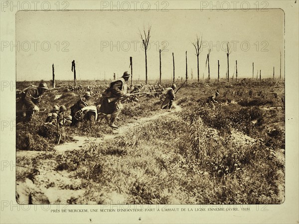 Infantry soldiers leaving trenches and charging the Germans at the battlefield at Merkem in Flanders during WWI