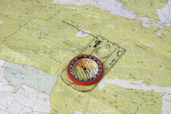 Magnetic compass on a map