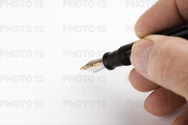 Fountain pen in mans hand