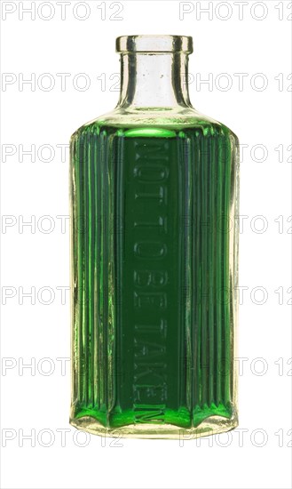 Bottle of green liquid