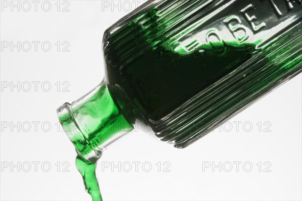 Bottle of green liquid