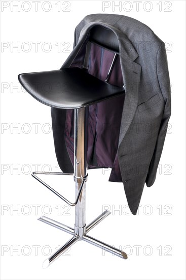 Black leather and chrome bar stool on a white background
