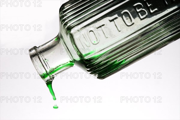 Bottle of green liquid