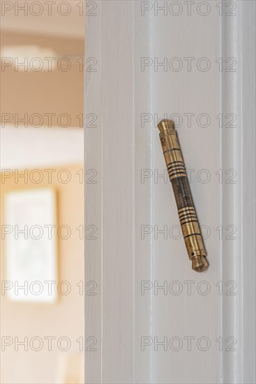 A Mezuzah fixed to an internal door