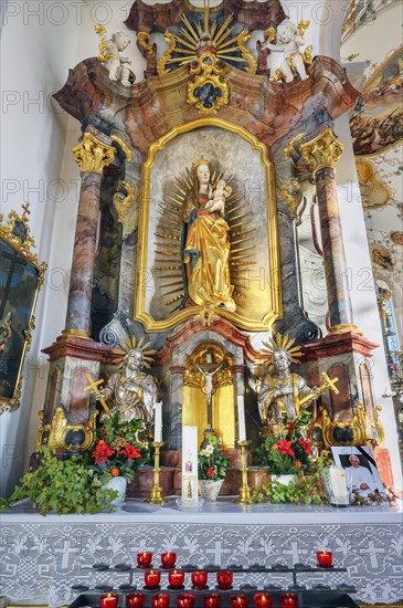 Side altar with offering candles