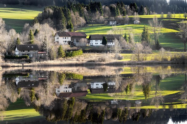 Landscape reflection at the Rottach reservoir