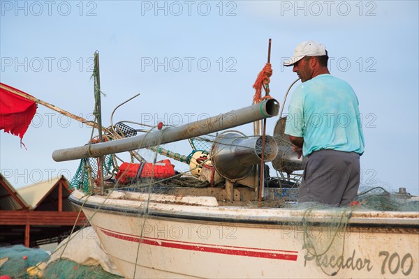 Fishing boat on the beach in Armacao de Pera