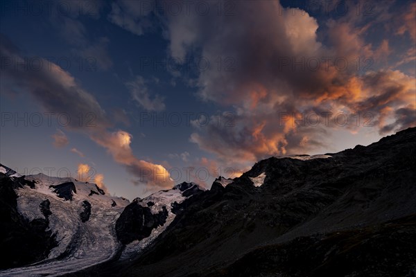 Morteratsch glacier in Bernina group with dramatic clouds