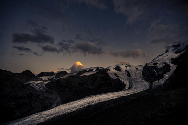 Morteratsch glacier in Bernina group with dramatic clouds