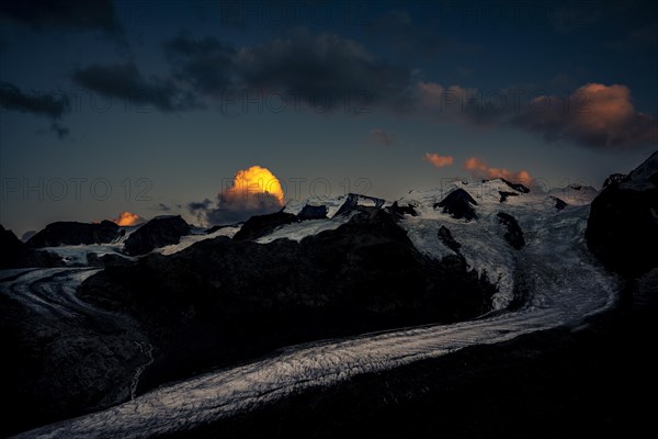 Morteratsch glacier in Bernina group with dramatic clouds