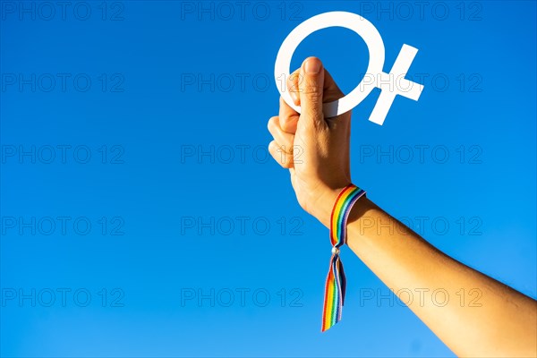 Hand of a woman with female symbol in favor of feminism