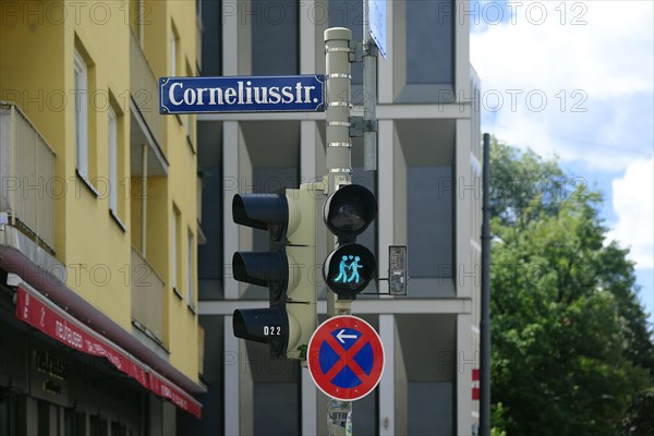 Gender-inclusive traffic light sign