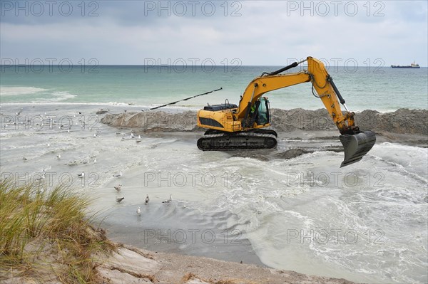 Dredger for land reclamation on a construction site in the Baltic Sea near Ahrenshoop