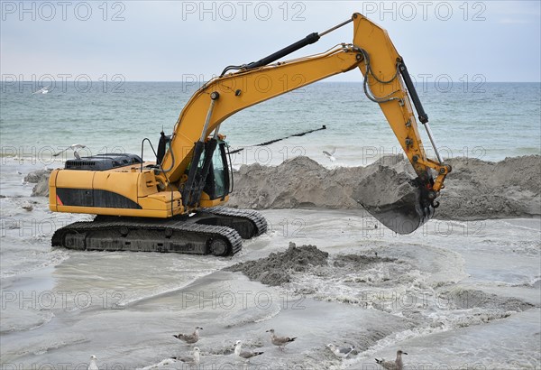 Dredger for land reclamation on a construction site in the Baltic Sea near Ahrenshoop