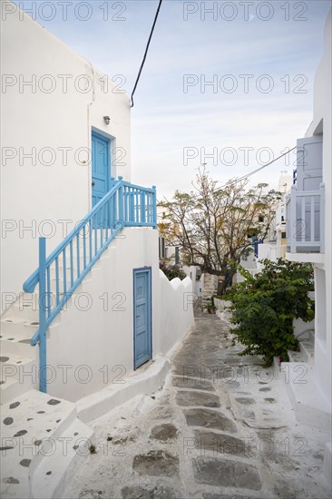 Cycladic white houses with blue shutters
