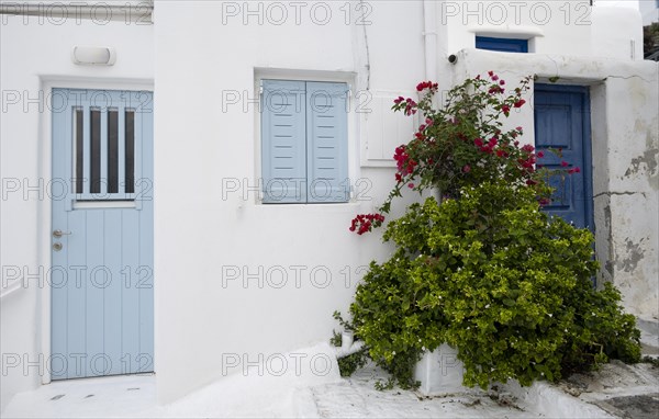 House facade with blue entrance door