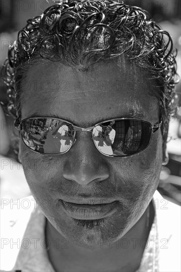 Portrait with Sunglasses of a Mauritian