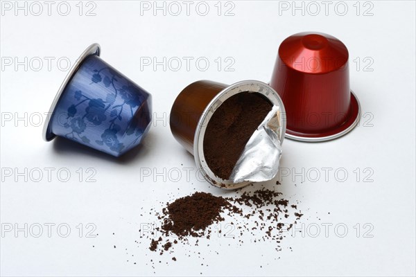 Opened coffee capsule and coffee powder