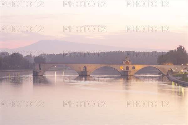 The Pont des Avignon and the Palais des Papes and Cathedral across the Rhone river