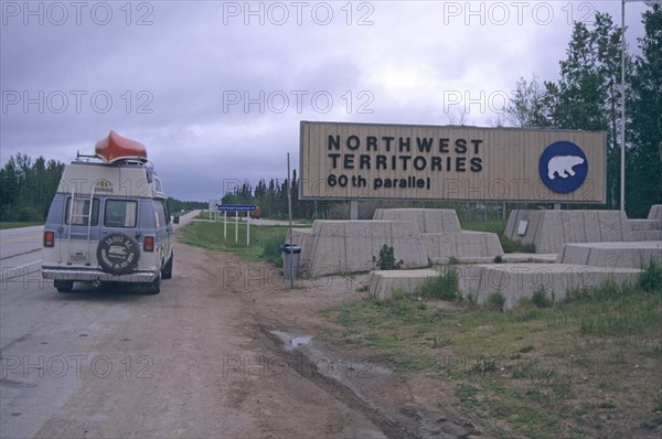 Motorhome at the notice to enter the Northwest Territory at the sixtieth parallel