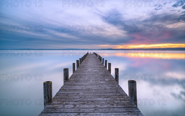 Lake Neusiedl with jetty at sunset