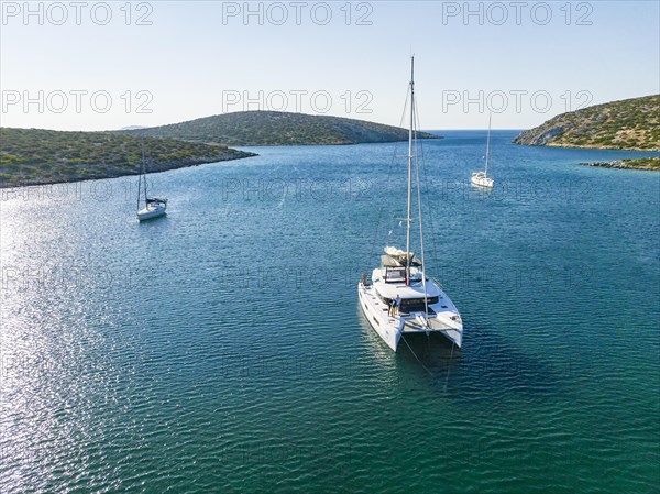 Sailing catamaran in a bay