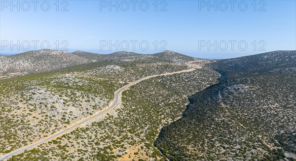 Lonely road in dry landscape