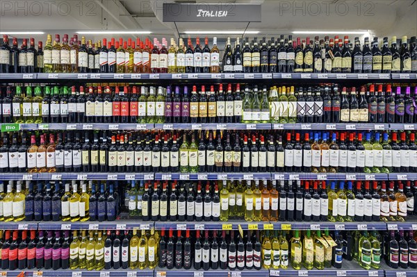 Shelves with wine bottles in the wholesale market