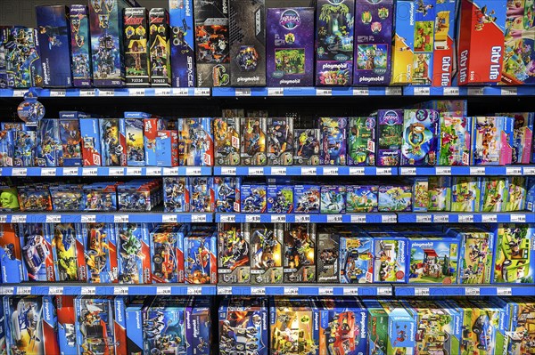 Shelf with Playmobil system toys in the wholesale market