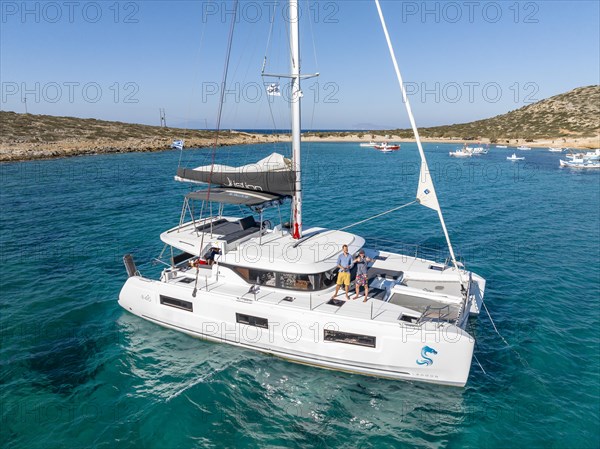 Sailing catamaran in a bay