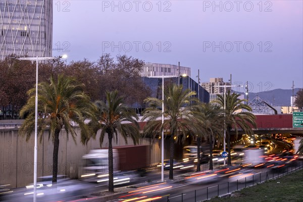 Dense traffic on Ronda de Mar avenue at sunset in the city of Barcelona in Catalonia Spain