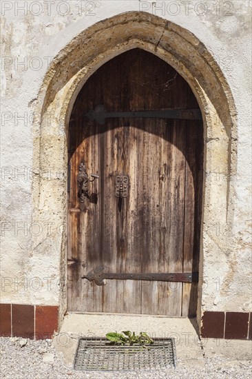Wooden door at the church of St Laurentius