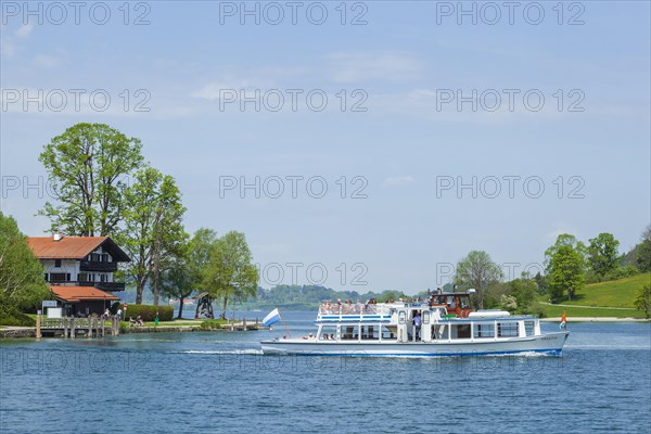 Shore area with houses and excursion boat at the Tegernsee