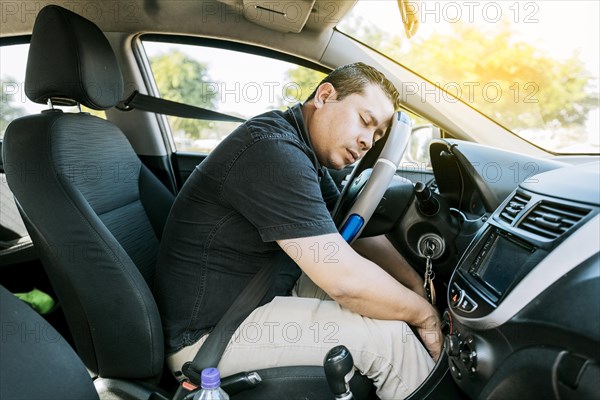 View of a driver asleep at the wheel