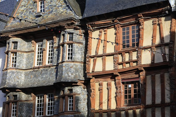 Half-timbered houses clad in slate on the Place du General Leclerc