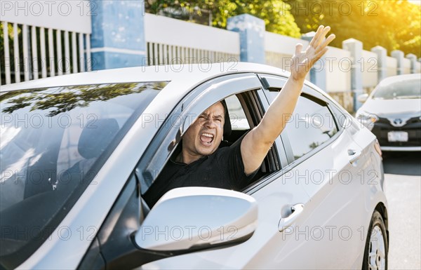 Angry driver yelling at another driver