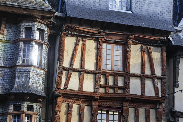 Half-timbered houses clad in slate on the Place du General Leclerc