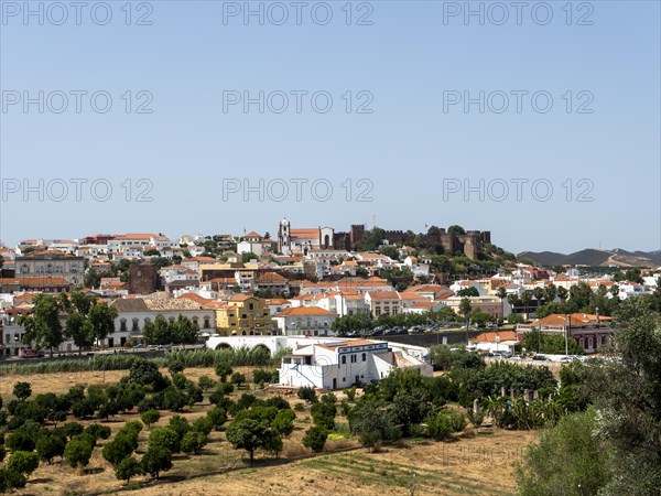 Cityscape of Silves with Moorish Castle and Cathedral on top of the hill