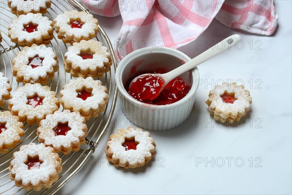 Christmas biscuits and bowl of redcurrant jelly