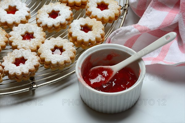 Christmas biscuits and bowl of redcurrant jelly