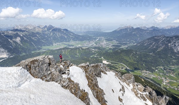 Hiker looking down from Thaneller