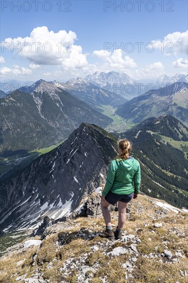 Hiker at the summit of Thaneller