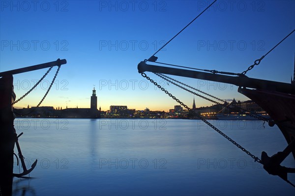 Illuminated houses and ships in Gamla Stan