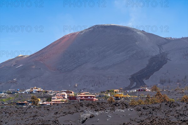Remains of the village of Todoque in front of the new volcano at the Canos de Fuego Visitor Centre
