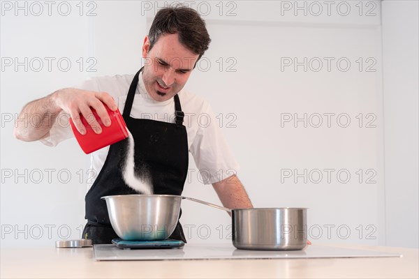 Challenger man cooking a red velvet cake at home