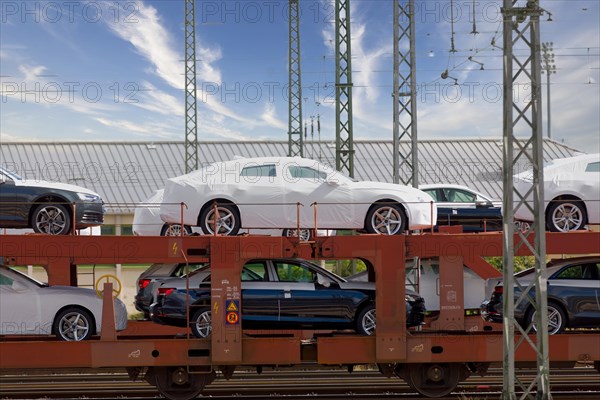 Car loading onto freight wagons