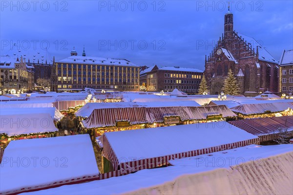 Winter Christkindlesmarkt with the Church of Our Lady on the right