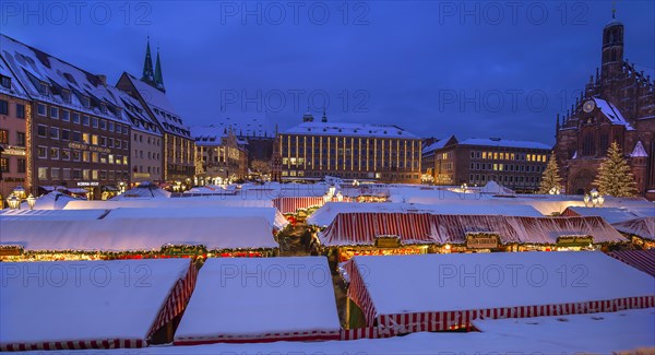 Winter Christkindlesmarkt with the Church of Our Lady on the right